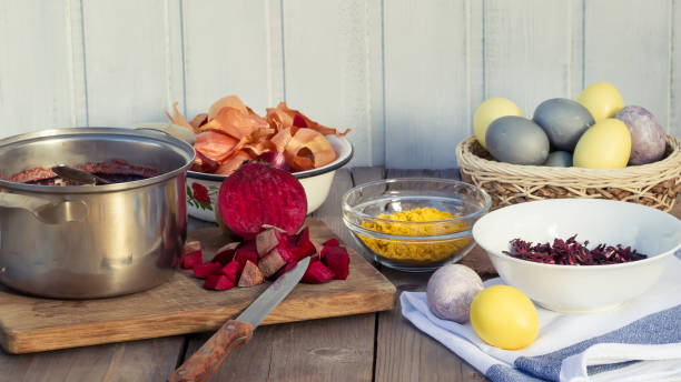 Process of coloring Easter eggs with various food natural dyes. Preparing for Easter. Process of coloring Easter eggs with various food natural dyes. Preparing for Easter easter egg coloring stock pictures, royalty-free photos & images