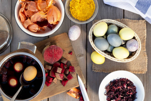 istock Process of coloring Easter eggs with various food natural dyes. Preparing for Easter. 1302457680