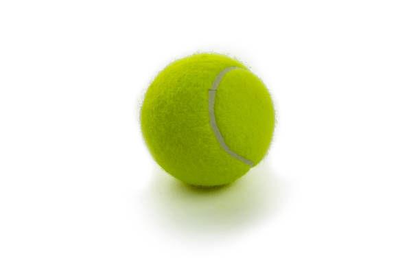 istock yellow tennis ball isolated on white background 1302458653