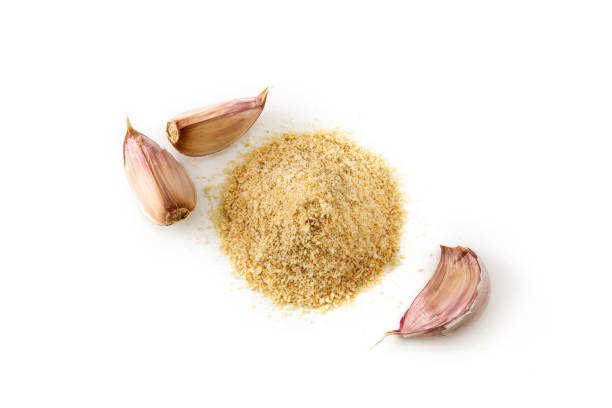 istock Garlic cloves and garlic powder 1302460153