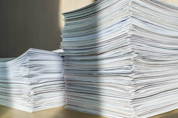 istock pile of paper documents in the office 1302460175