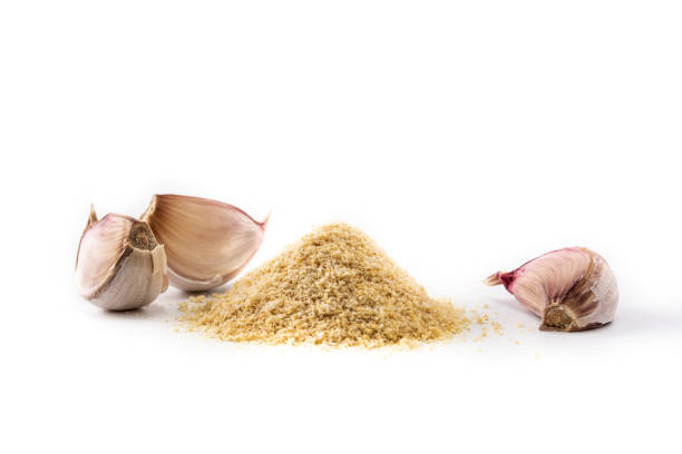 istock Garlic cloves and garlic powder 1302460177