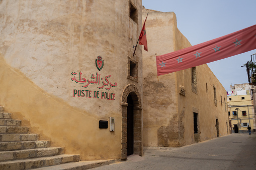 A Police post in a street of El-Jadida, with painting on the wall.\nEl-Jadida, Morocco.