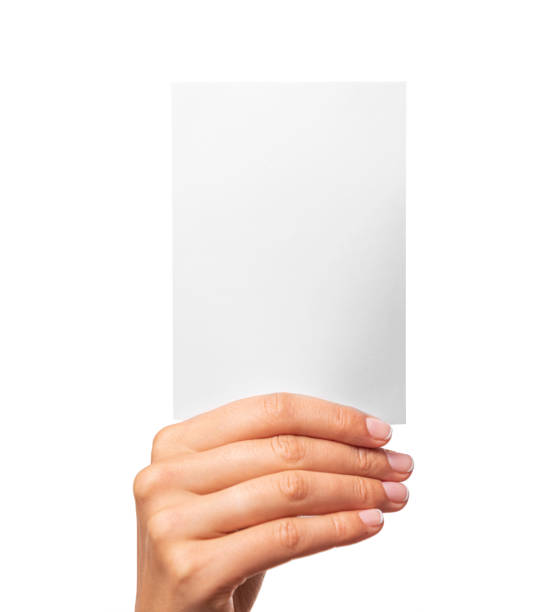 istock Female hand holds a white card isolated on white background. 1302461595