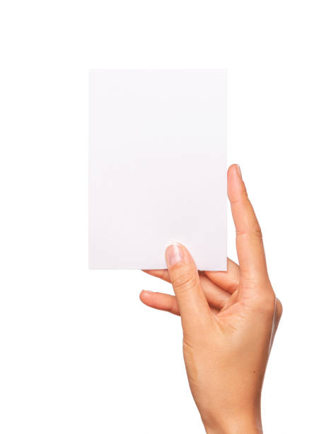 istock Female hand holds a white card isolated on white background. 1302461619