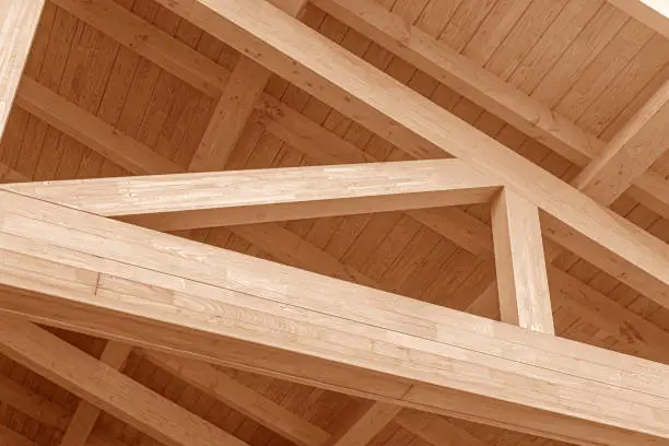 Photo of Wooden roof structure. Glued laminated timber roof.