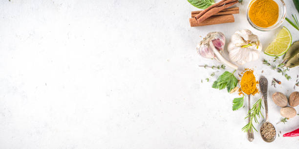 istock Fresh herbs, dried colorful spices 1302464303