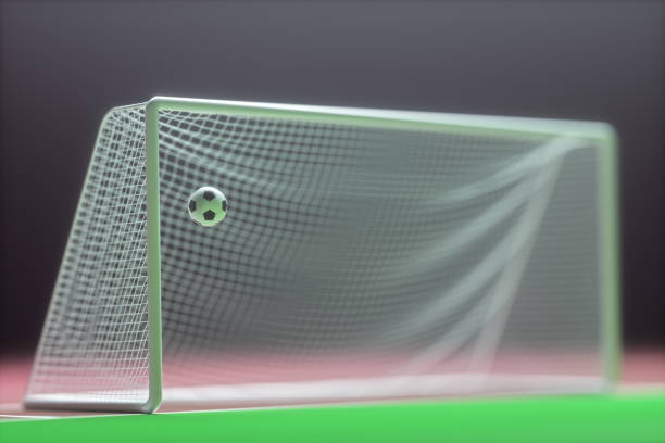 istock Soccer Ball And Stadium Goal Net 1302464316