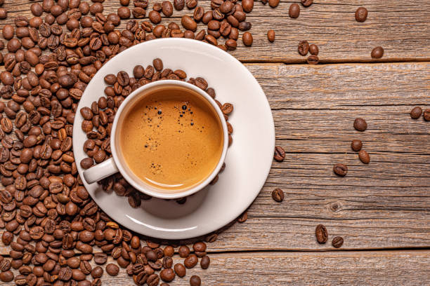 istock Cup with coffee on a wooden table. 1302464372