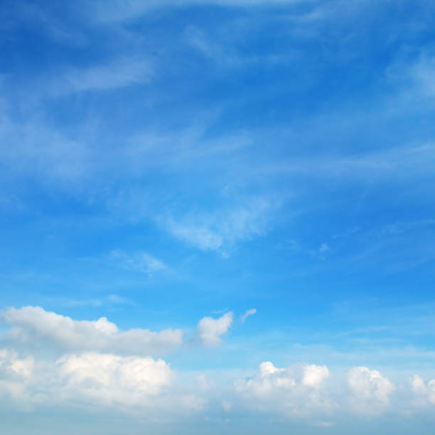 istock Blue sky with beautiful natural white clouds. 1302466652