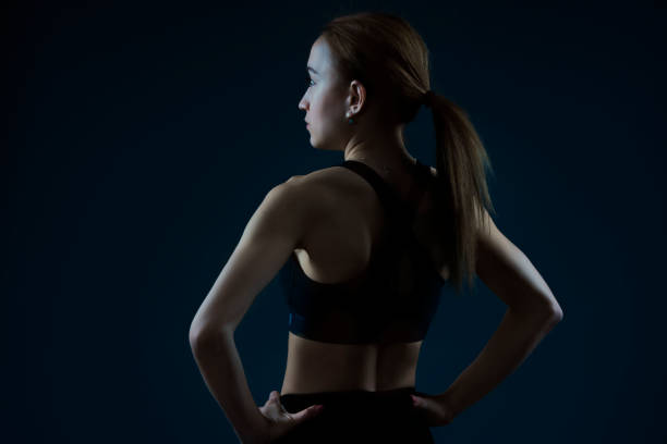 istock Back view of a female athlete 1302466725