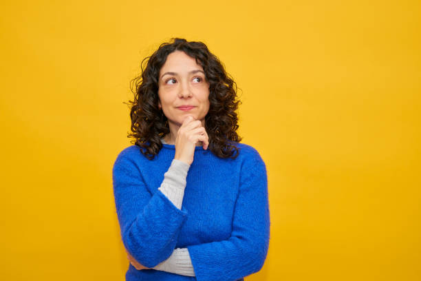 istock Woman thinking and looking up 1302466726