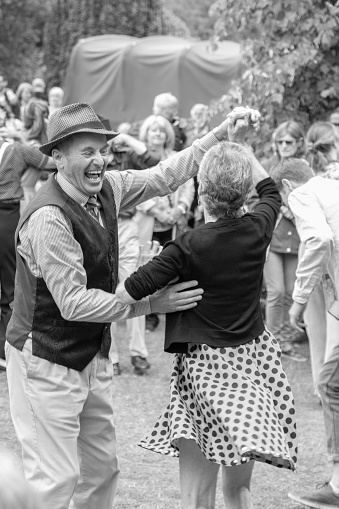 A man and woman dancing at The Valley Gardens 1940's Day in Harrogate,UK.