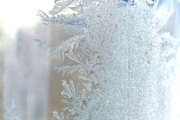 istock Beautiful frosty pattern on a glass jar 1302471342