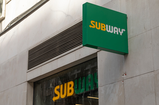 Madrid, Spain - February 07, 2021: Subway fast food and junk food restaurant, in Genova street, Salamanca district, Spain. Outdoor logo.