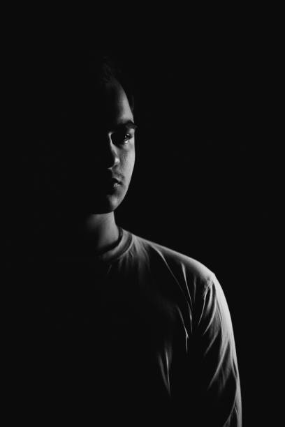 istock Low Key Portrait of a Man 1302472091