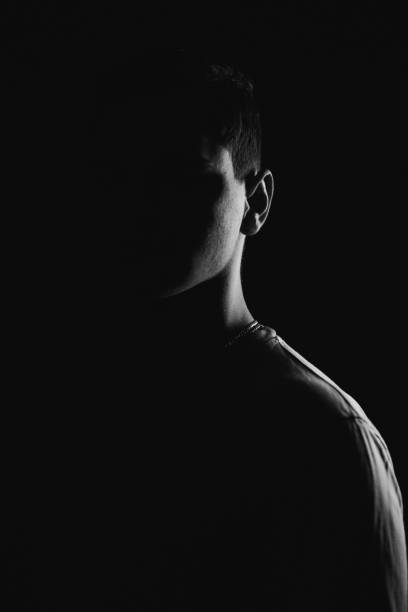 istock Low Key Portrait of a Man 1302472100