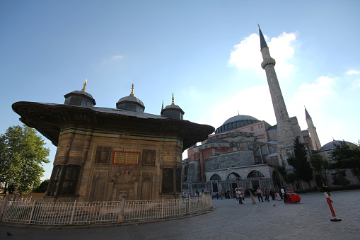 Istanbul, Turkey-June 9, 2013: Built between the entrance gate of Topkapı Palace in Istanbul and Hagia Sophia, III. Ahmet Fountain. The fountain, one of the examples of Turkish rococo style, was built in 1728.
