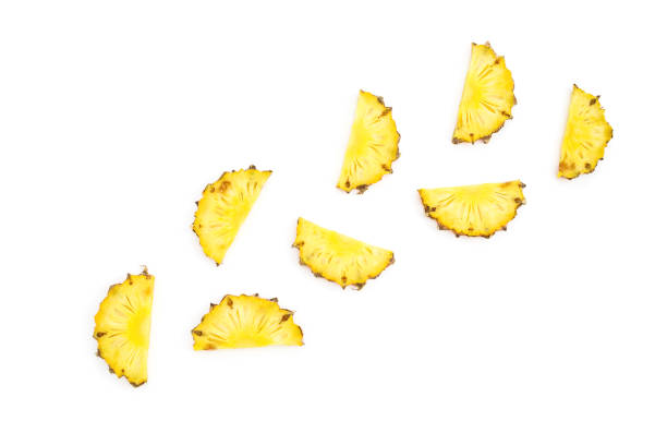 istock Tropical fruits concept. Sliced pineapple isolated on white background. Flat lay 1302473607