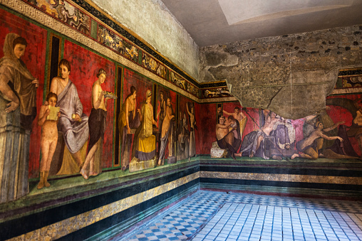 Mural fresco of the Villa of the Mysteries in the ruins of the ancient archaeological site of Pompeii, Italy
