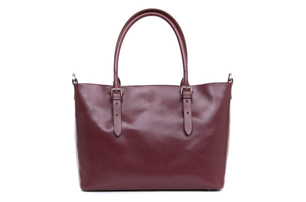 istock expensive red female leather bag on a handle isolated on a white background 1302475986