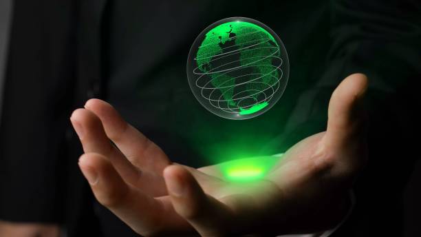 istock Human hand holding earth globe holographic technology 1302476279