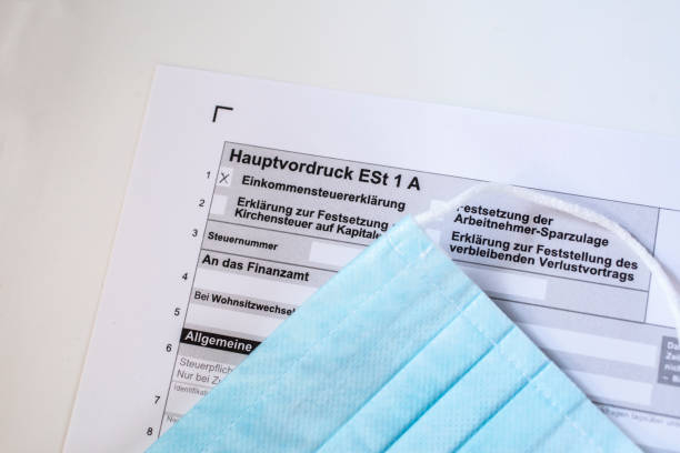 istock Request for emergency aid, close-up of a German application form/allowance for Corona emergency aid - Emergency aid Corona. 1302476651