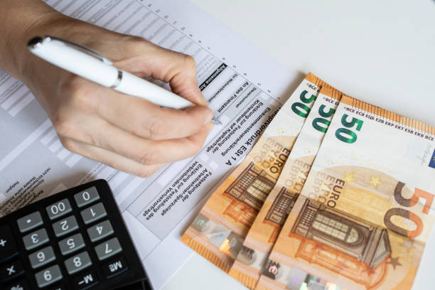 istock Documents for Tax return, close-up of a German application form. 1302476654