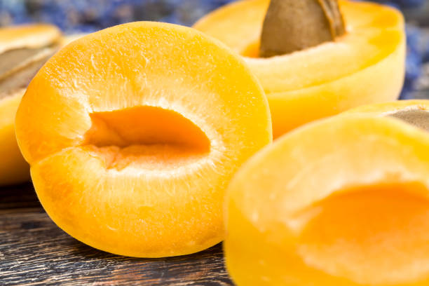 istock natural sliced orange peaches or apricots 1302479398