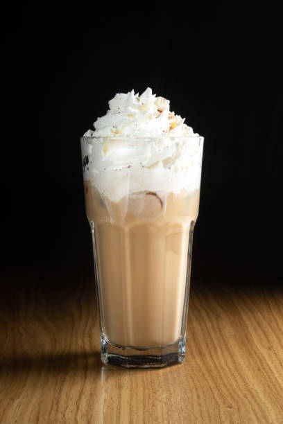 istock Iced coffee with ice, milk and whipped cream 1302480878