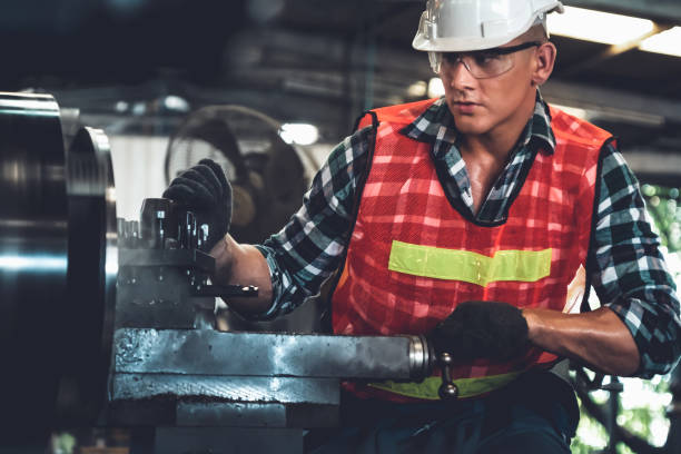 istock Smart factory worker or engineer do machine job in a manufacturing workshop 1302481756