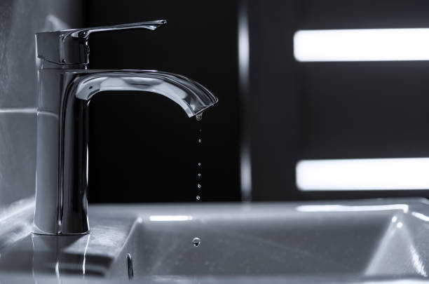 istock Clean water is dripping from the faucet sink. 1302482038