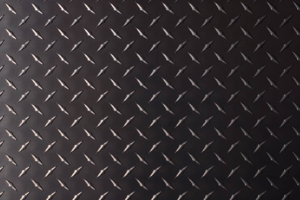istock rough steel texture with corrugated pattern. dark metal background. 1302483441