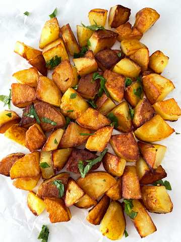 close-up of roasted potatoes with parsley