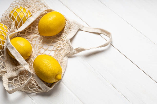 istock Ripe lemons in an eco-friendly bag 1302483620