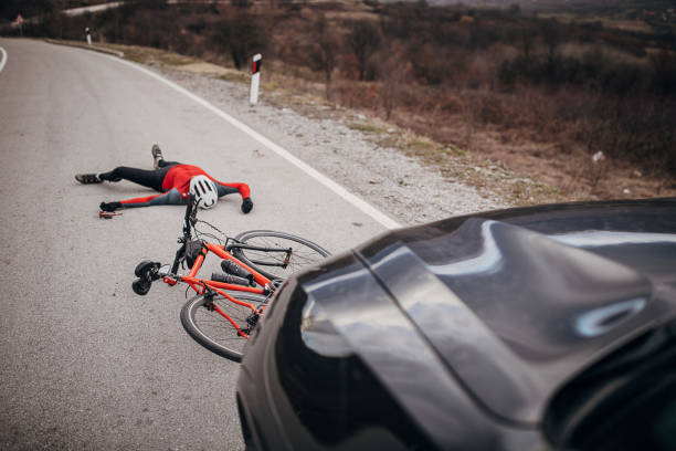 istock Cyclist got hit by a car 1302484594