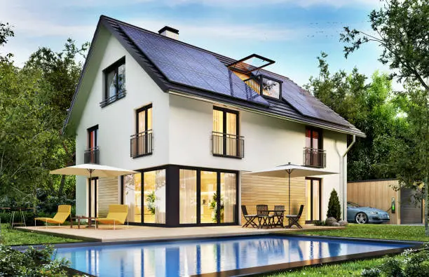 Photo of Modern house with solar panels on the roof and electric vehicle