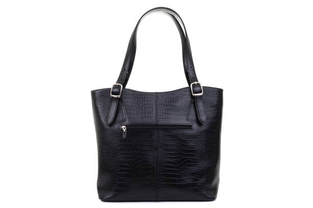 istock women black leather bag isolated on white background 1302486200