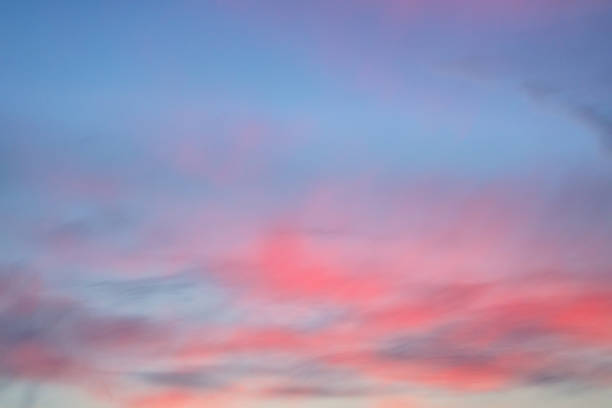 Beautiful pastel sunset with colorful clouds on the blue sky