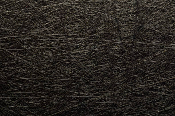 istock Rough grungy black fleecy cardboard with great texture 1302503588