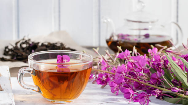 istock Herbal tea made from fireweed known as blooming sally in teapot and cup 1302509659