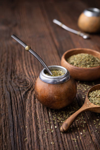 istock Healthy infused drink, classic Yerba Mate tea in a gourd with mobilla 1302510020