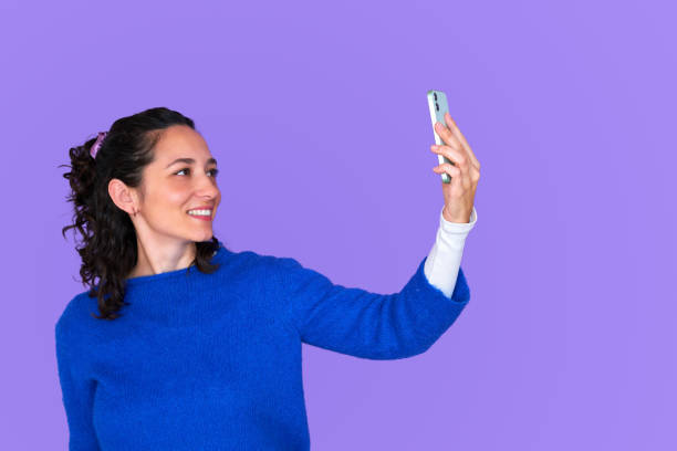 istock Girl taking selfie 1302516815
