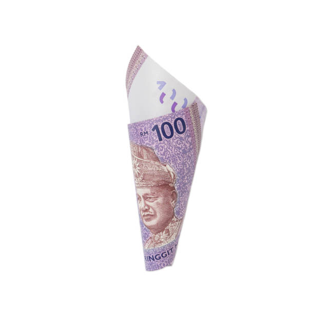 istock A 100 MYR banknote isolated on white background. 1302521021