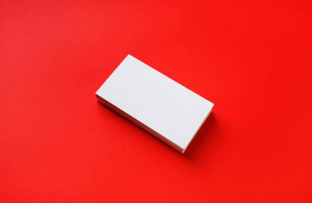 istock Business card on red 1302521748
