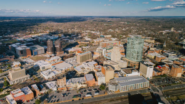 Aerial over Durham, North Carolina Aerial over Durham, North Carolina. Durham is part of the Research Triangle region in North Carolina. durham north carolina stock pictures, royalty-free photos & images