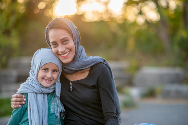 istock Muslim mother and daughter 1302532833