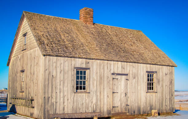 istock wooden building in the winter 1302535678