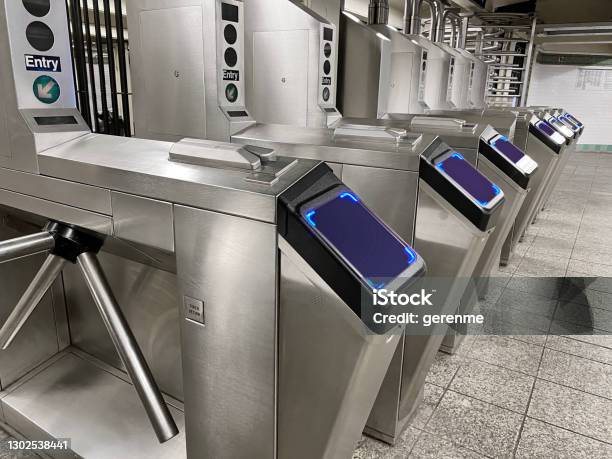 Subway Turnstiles Stock Photo - Download Image Now - New York City Subway, Turnstile, Building Entrance