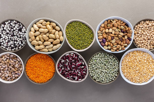 istock Different types of legumes in bowls 1302538657